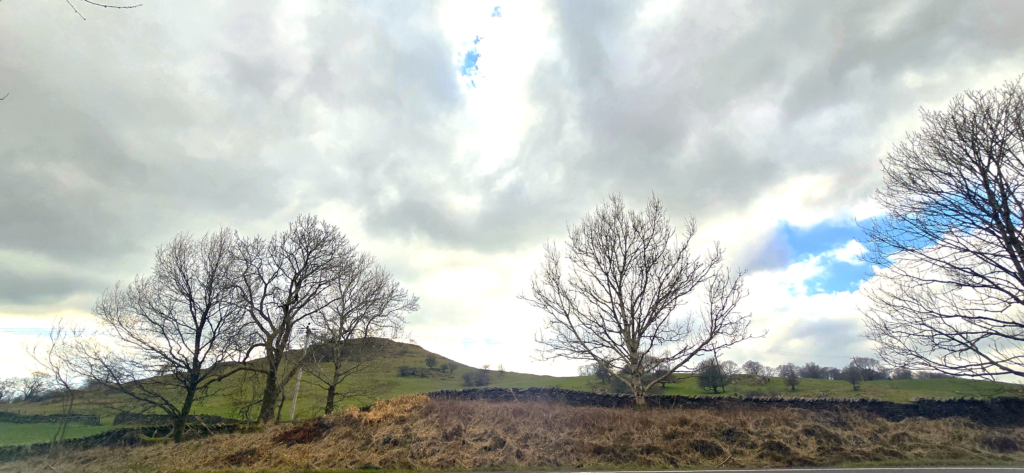 Rolling green hills symbolising calm and children’s emotional wellbeing.